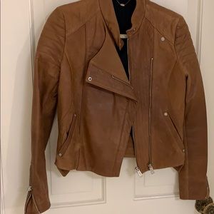 Tan leather jacket by McGinn